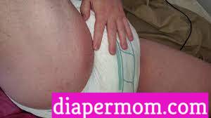 ABDL girl rubbing her pussy in a diaper